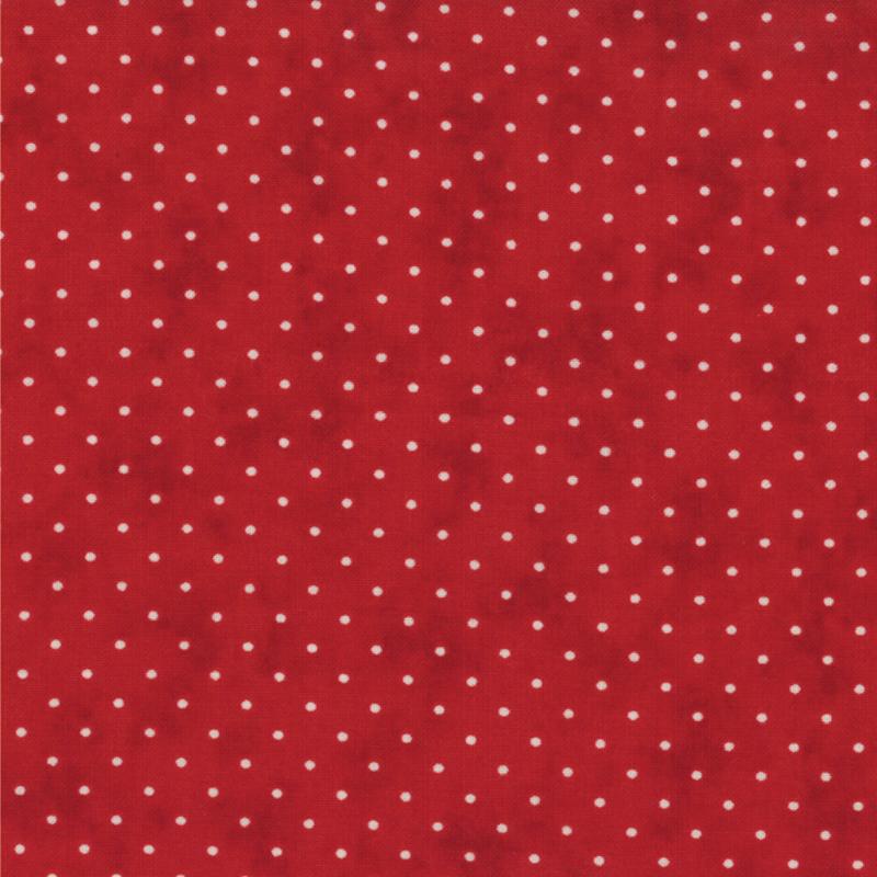 White pin dots on real red